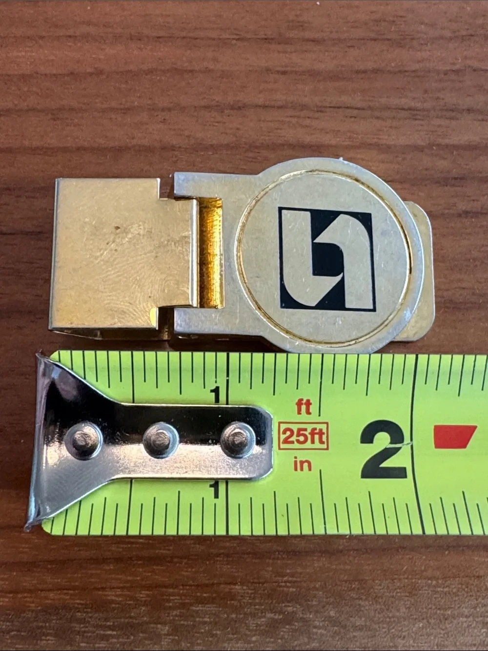 Vintage Gold-tone Money Clip with Abstract Black Logo